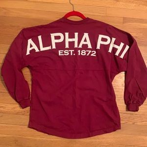 Alpha Phi size small maroon spirit jersey.